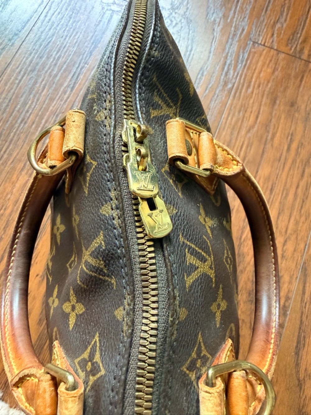 Louis Vuitton Brown Monogram Alma Handbag with Tan Trim - Picture 4 of 7